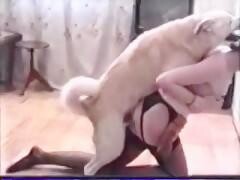 Slutty woman fucks with her white dog